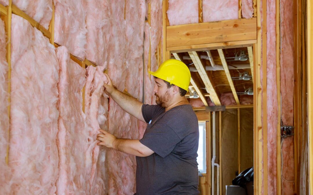 panama-man-installing-thermal-insulation-layer-wall-using-mineral-wool